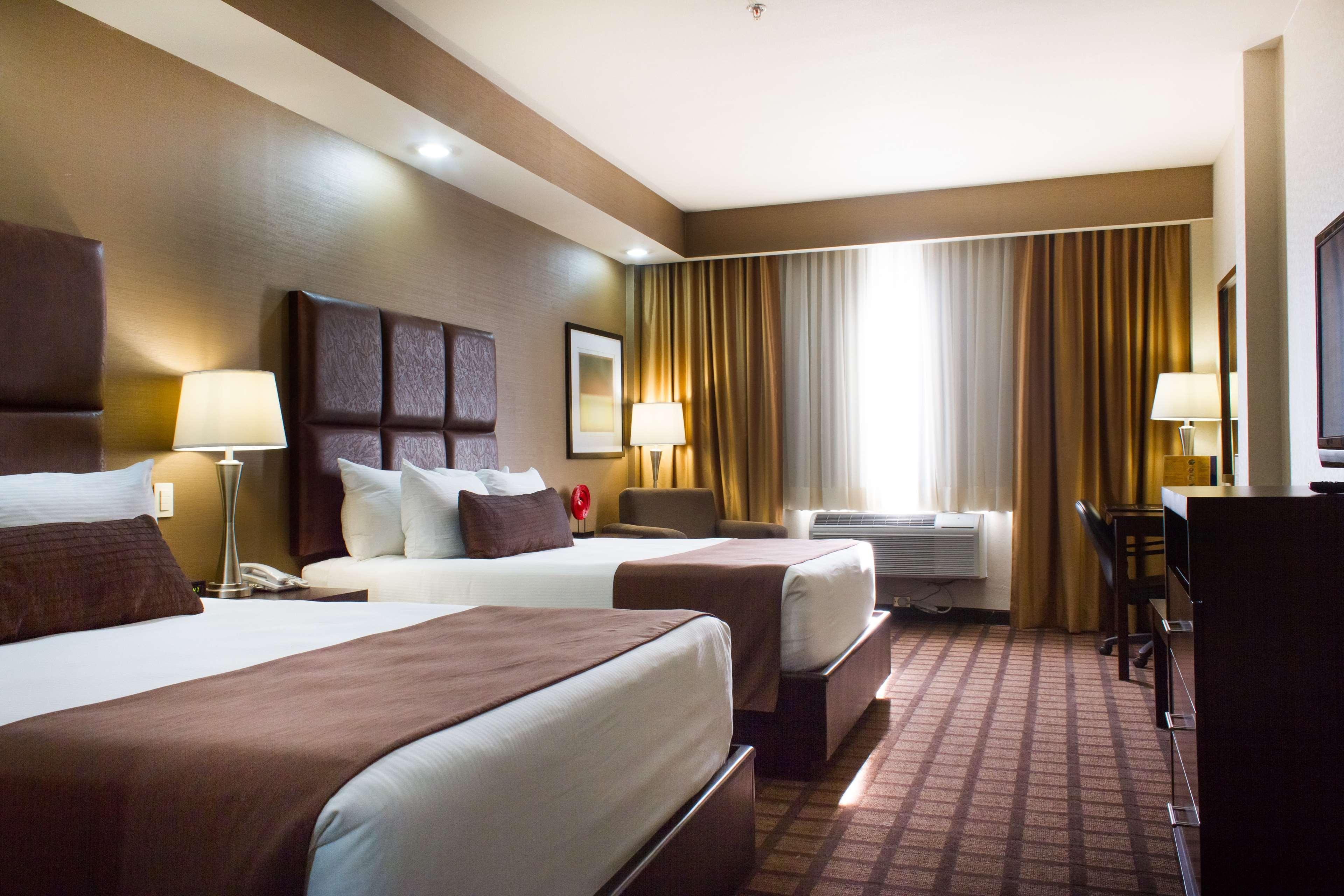 Best Western Premier Monterrey Aeropuerto Apodaca Екстер'єр фото A typical hotel room